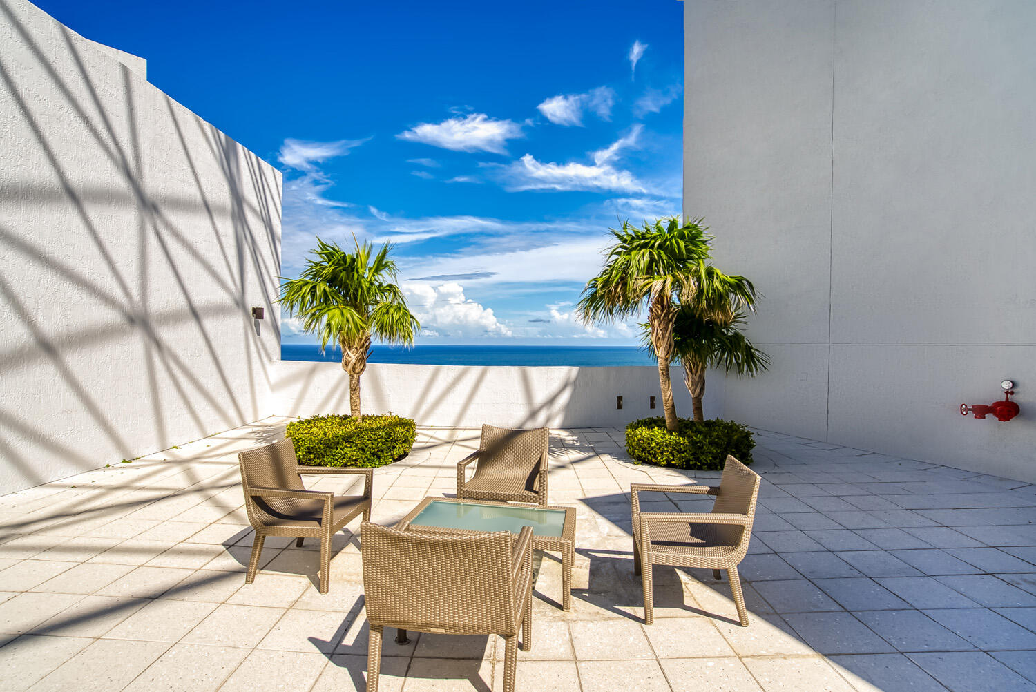18911 Collins Avenue, Unit 506 ON 5 Sunny Isles Beach, FL 33160 - Photo 61 of 88 a view of a chairs and table in patio