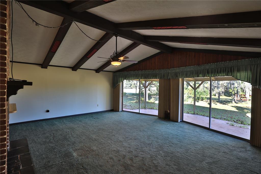 2155 Southeast County Highway 484 Belleview, FL 34420 - Photo 11 of 41 an empty room with windows