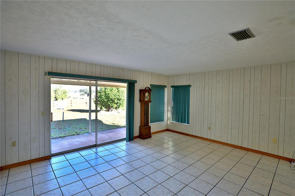 2155 Southeast County Highway 484 Belleview, FL 34420 - Photo 16 of 41 a view of an empty room with window