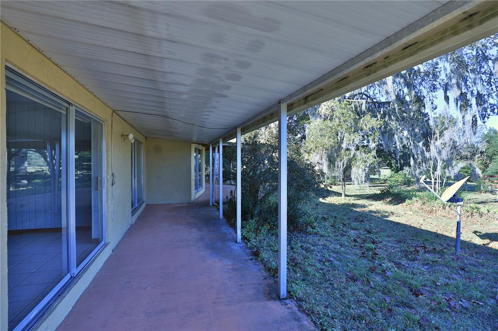 2155 Southeast County Highway 484 Belleview, FL 34420 - Photo 31 of 41 a view of a porch