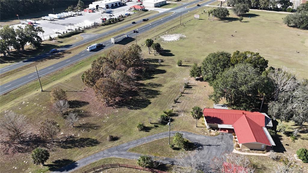 2155 Southeast County Highway 484 Belleview, FL 34420 - Photo 39 of 41 a view of swimming pool with a yard