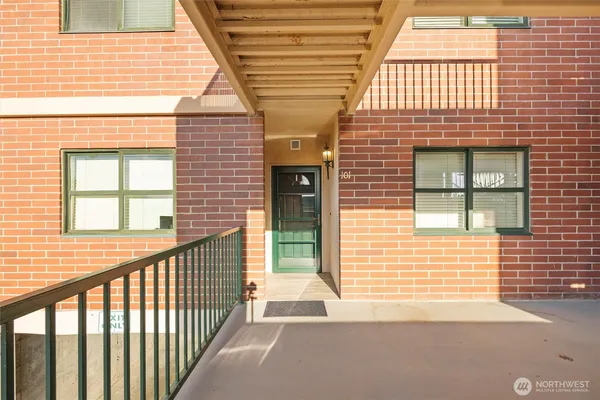 a view of a brick house with a window