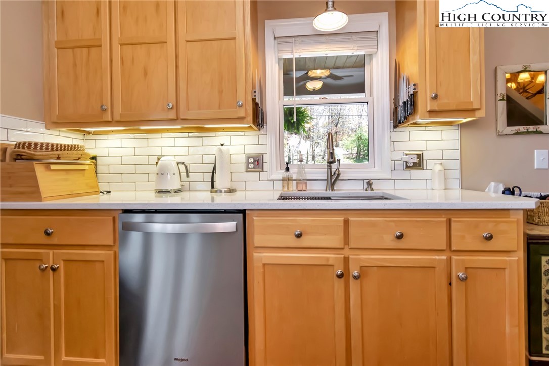 190 Summit Park Circle Boone, NC 28607 - Photo 13 of 50 a kitchen with stainless steel appliances granite countertop white cabinets and a sink