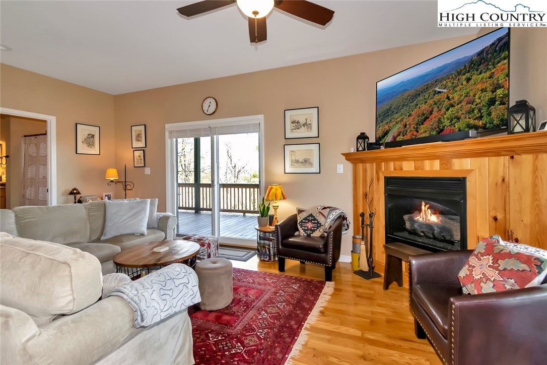190 Summit Park Circle Boone, NC 28607 - Photo 16 of 50 a living room with furniture and a fireplace
