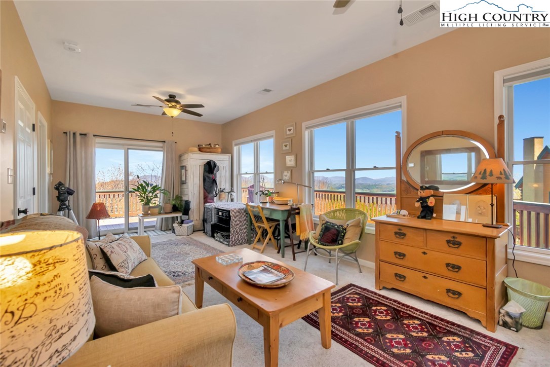 190 Summit Park Circle Boone, NC 28607 - Photo 28 of 50 a living room with furniture and a window