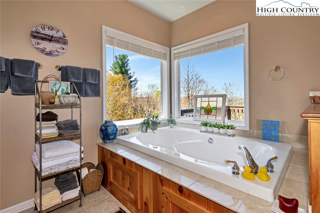 190 Summit Park Circle Boone, NC 28607 - Photo 30 of 50 a bath tub sitting next to a window