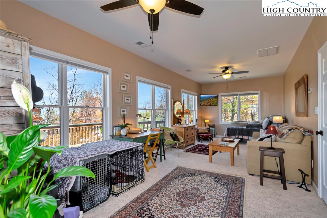 190 Summit Park Circle Boone, NC 28607 - Photo 34 of 50 a very nice looking living room with furniture and a large window