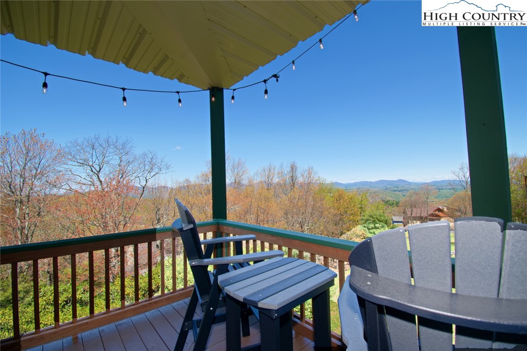 190 Summit Park Circle Boone, NC 28607 - Photo 36 of 50 a view of a balcony with furniture and a garden