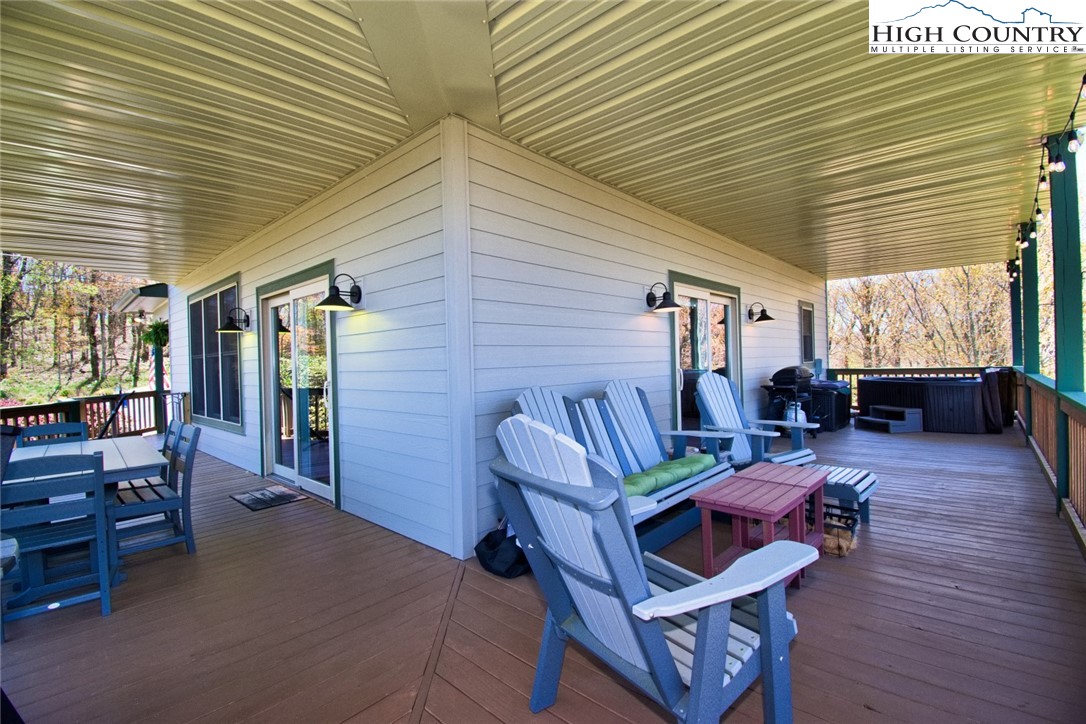 190 Summit Park Circle Boone, NC 28607 - Photo 38 of 50 a view of a patio with chairs and a table