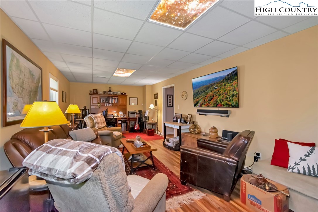 190 Summit Park Circle Boone, NC 28607 - Photo 42 of 50 a living room with furniture and a lamp