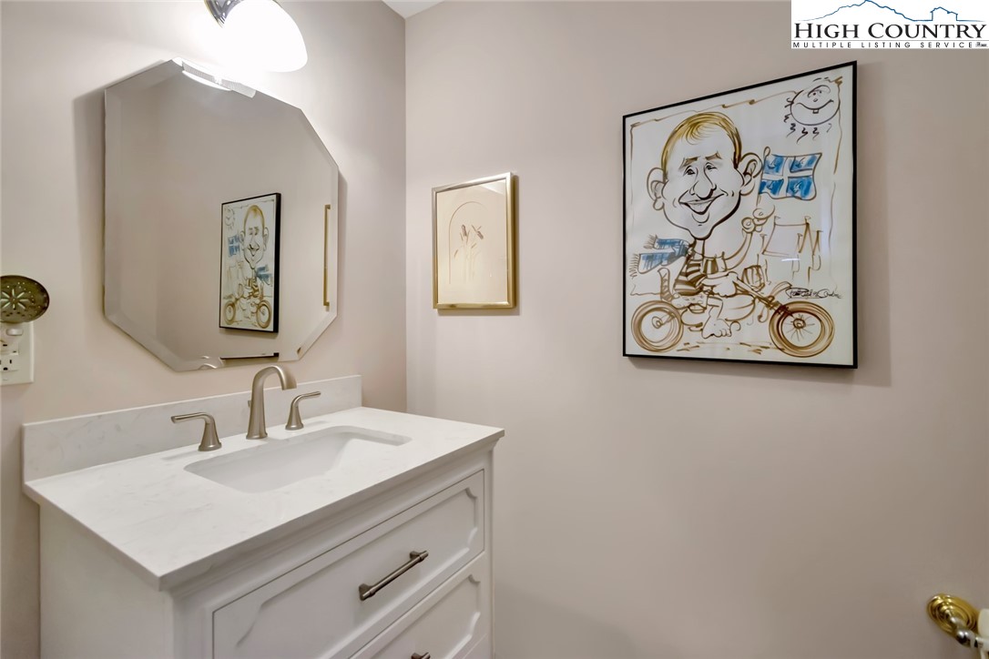 190 Summit Park Circle Boone, NC 28607 - Photo 43 of 50 a bathroom with a sink and a mirror