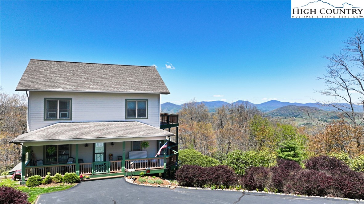 190 Summit Park Circle Boone, NC 28607 - Photo 46 of 50 a view of house with a yard and sitting area
