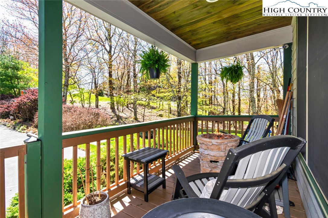 190 Summit Park Circle Boone, NC 28607 - Photo 6 of 50 a view of a city from a balcony with furniture