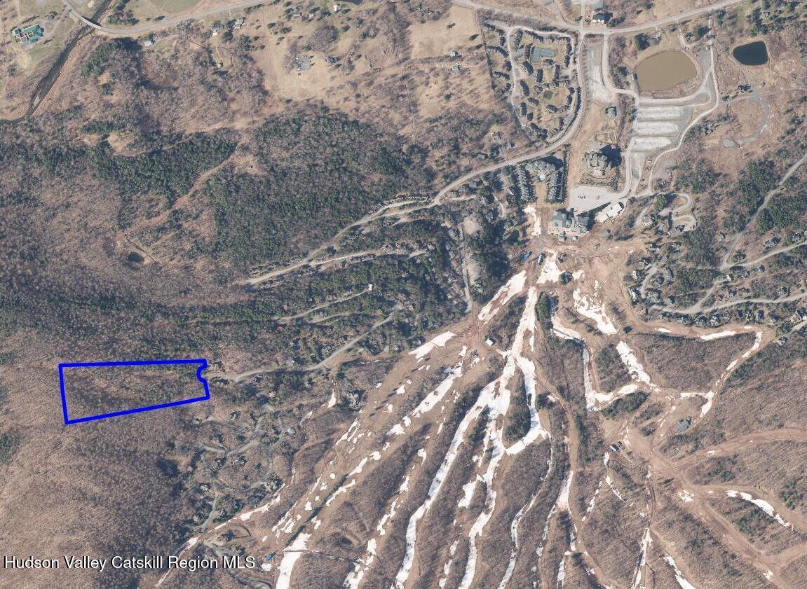 3 Rockledge Road Windham, NY 12496 - Photo 15 of 17 a street view with tall trees