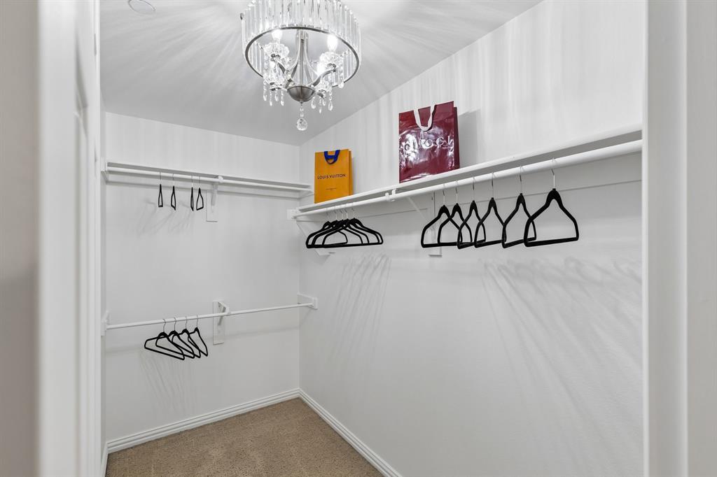 2916 Durango Place Bedford, TX 76021 - Photo 13 of 30 WOW! Is that a chandelier in the main bedroom closet? Why yes, it sure is!!!