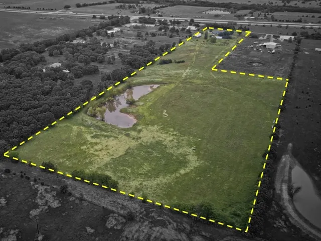 a bedroom with a sink and a window