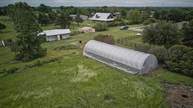 a garden view with a seating space