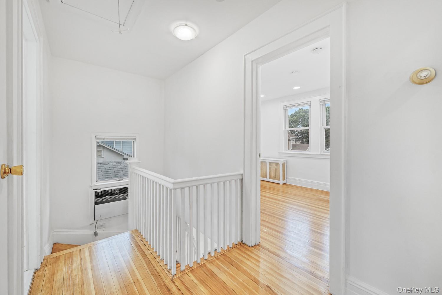 37 Keystone Place Hewlett, NY 11557 - Photo 24 of 45 a bedroom with a bed and a view of bathroom