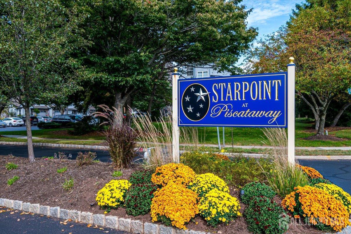 230 Nebula Road Piscataway, NJ 08854 - Photo 2 of 33 a sign broad on the side of the park