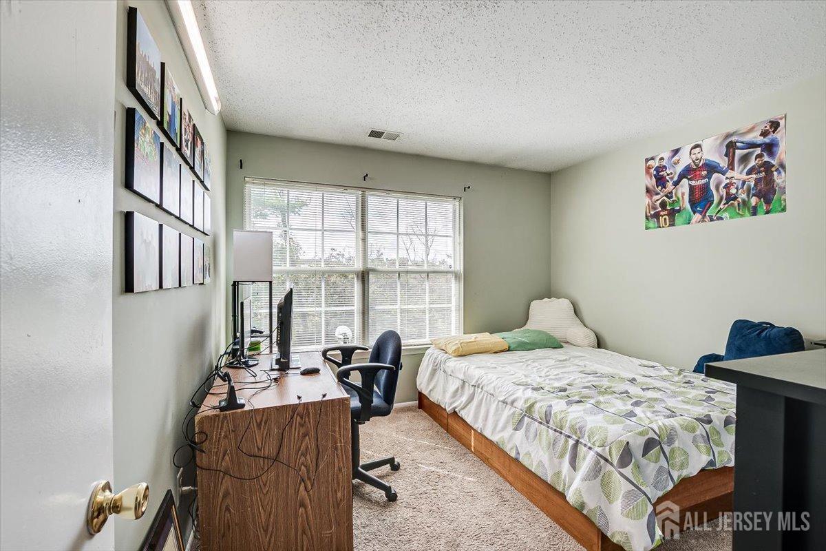 230 Nebula Road Piscataway, NJ 08854 - Photo 26 of 33 a bedroom with a bed furniture and a window