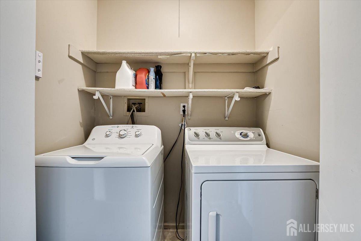 230 Nebula Road Piscataway, NJ 08854 - Photo 29 of 33 a utility room with dryer and washer