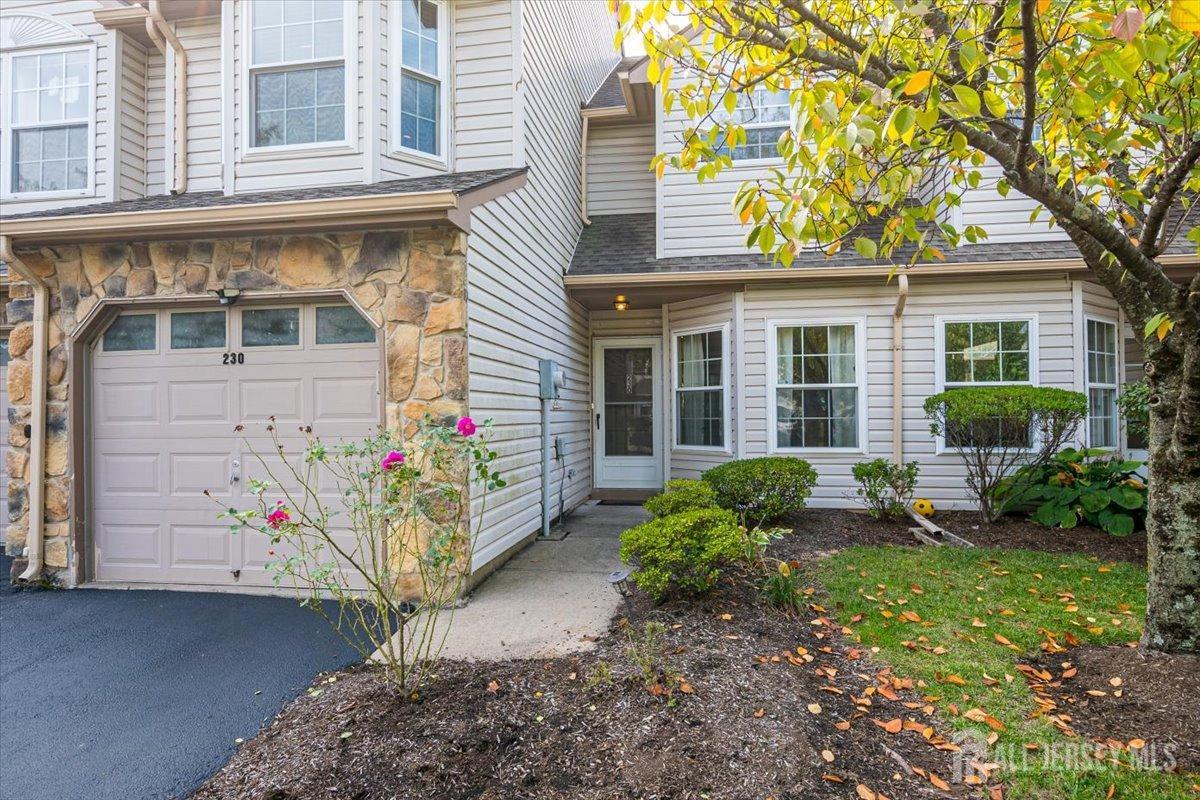 230 Nebula Road Piscataway, NJ 08854 - Photo 4 of 33 a view of a house with a yard and potted plants