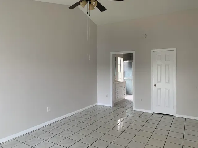 a view of an empty room and window