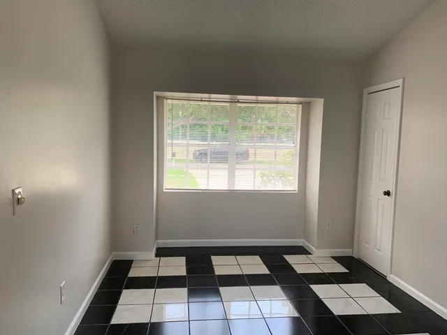 a picture of a black and white checkered floor