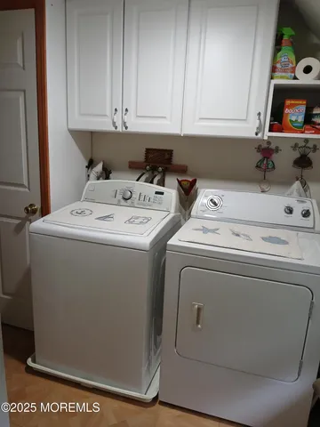 a bathroom with a sink a mirror and window