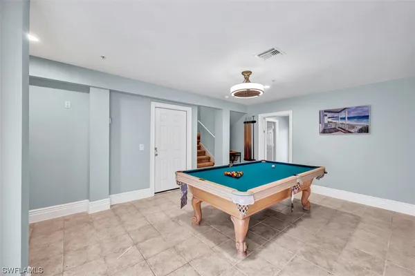 a room with furniture and window