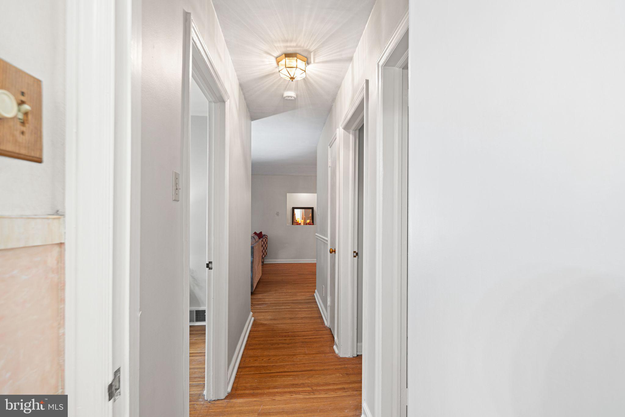 705 West Browning Road Oaklyn, NJ 08107 - Photo 17 of 42 Hallway from bedrooms leading into Living Room