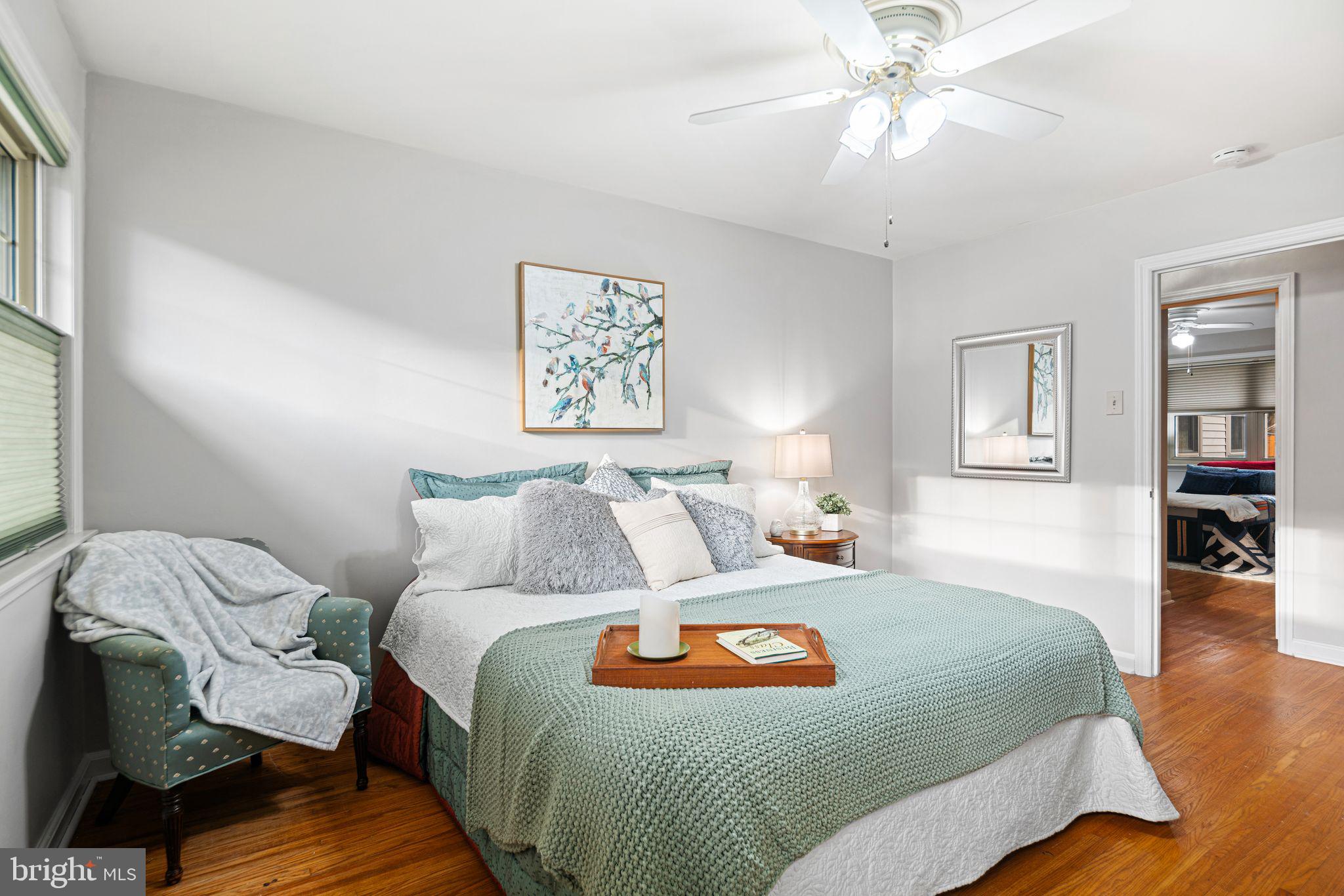 705 West Browning Road Oaklyn, NJ 08107 - Photo 19 of 42 Primary bedroom w/hardwood flooring