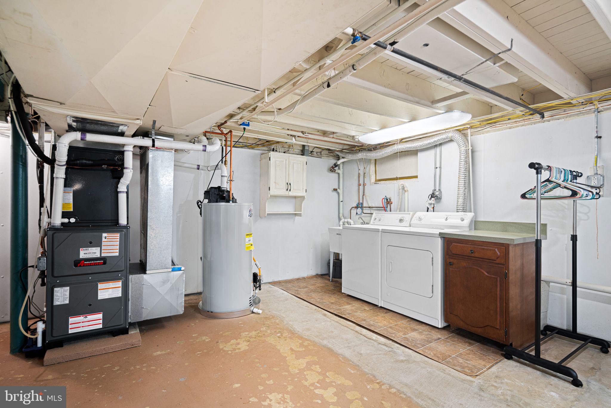 705 West Browning Road Oaklyn, NJ 08107 - Photo 31 of 42 Full basement with laundry & good head height