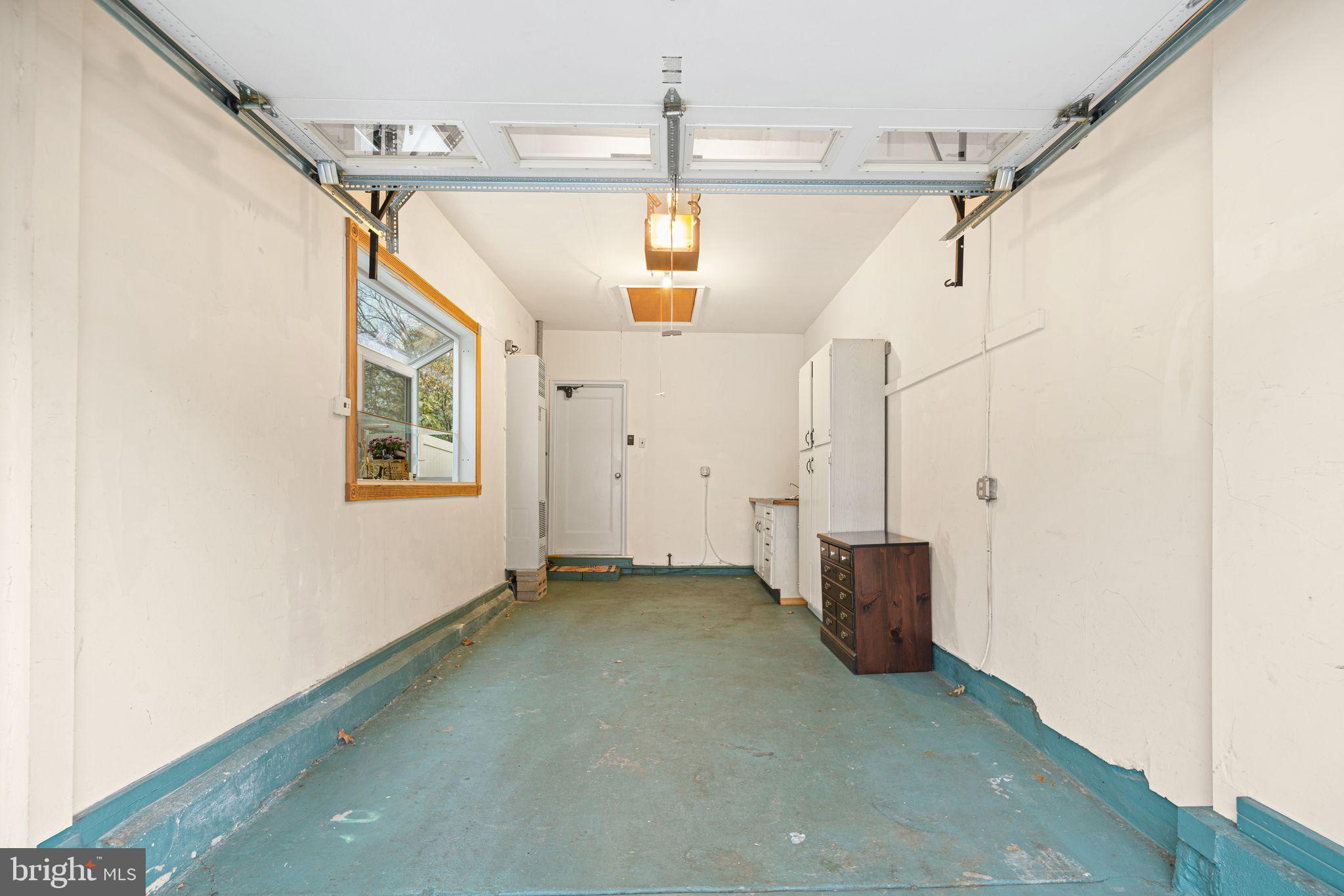 705 West Browning Road Oaklyn, NJ 08107 - Photo 37 of 42 Heated Garage w/garden window & utility sink