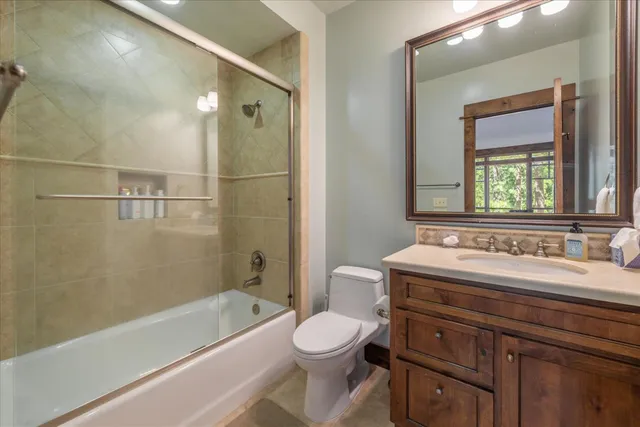 a bathroom with a sink a toilet and a bathtub