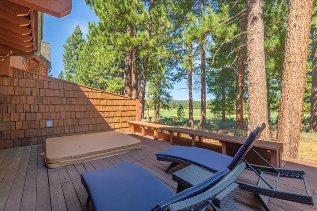 a view of a outdoor sitting area with furniture