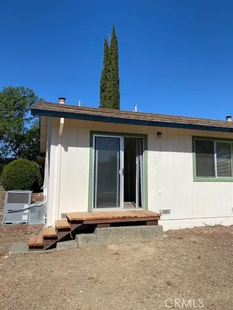 front view of a house with yard