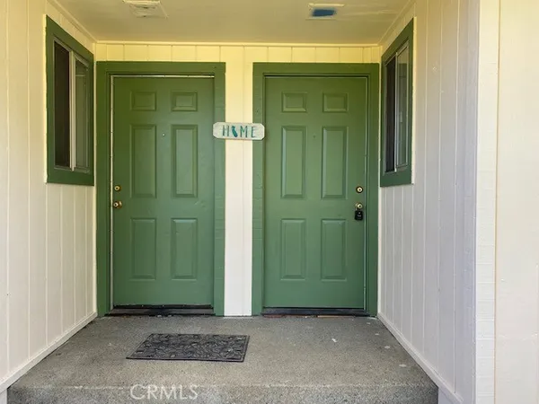 an empty room with mirror