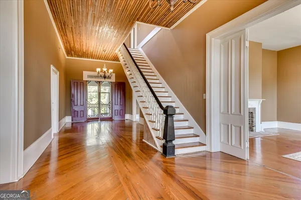 a kitchen with a sink cabinets and window