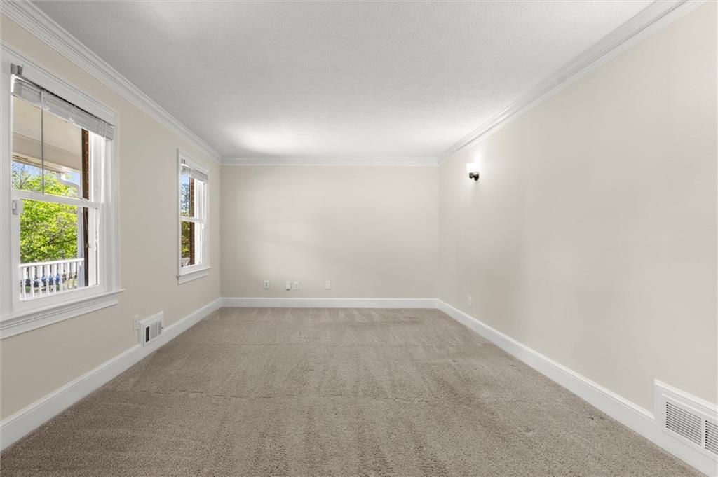 4922 Signal Court Southwest Lilburn, GA 30047 - Photo 20 of 49 an empty room with windows