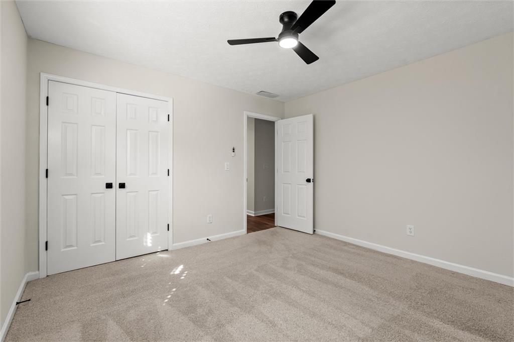 4922 Signal Court Southwest Lilburn, GA 30047 - Photo 37 of 49 a view of empty room