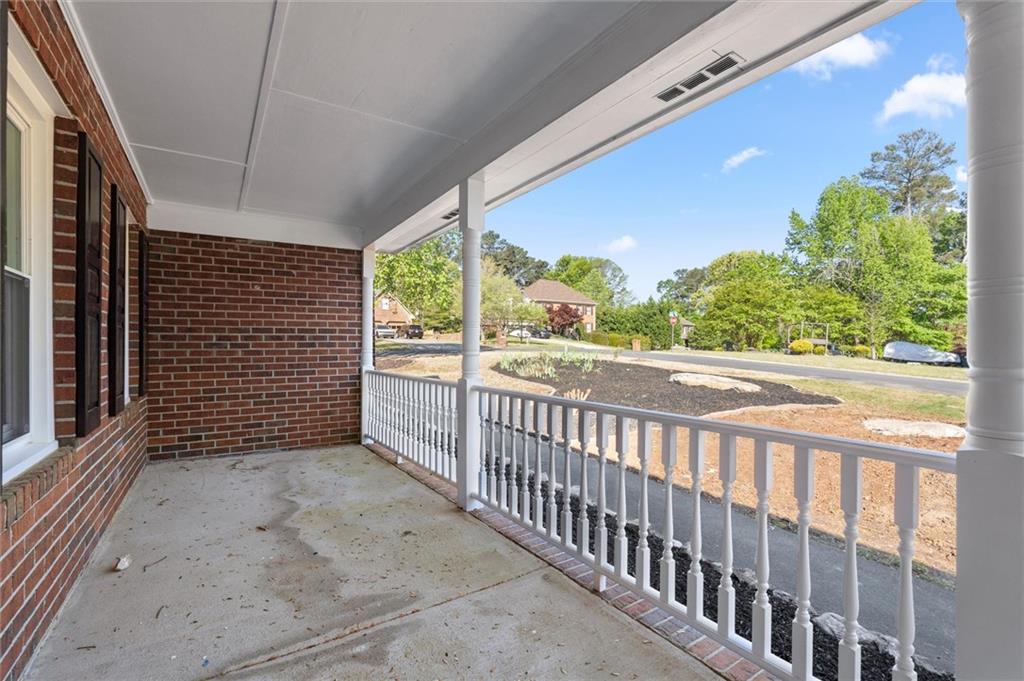 4922 Signal Court Southwest Lilburn, GA 30047 - Photo 4 of 49 a view of a porch