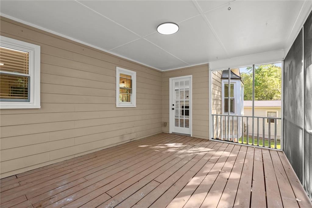 4922 Signal Court Southwest Lilburn, GA 30047 - Photo 44 of 49 a view of a house with wooden floor
