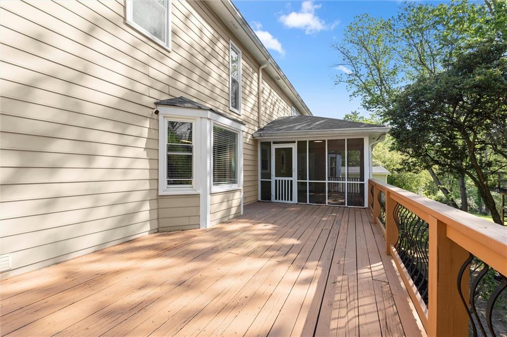 4922 Signal Court Southwest Lilburn, GA 30047 - Photo 46 of 49 a view of a house with a wooden floor