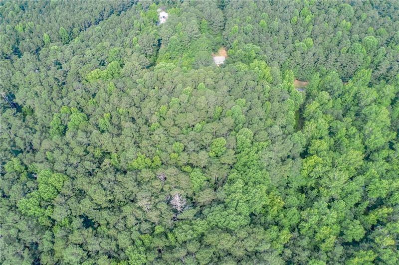0 Old Grogan Road Acworth, GA 30101 - Photo 8 of 13 a view of a lush green field