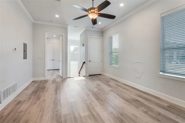 a view of kitchen with sink and wooden floor