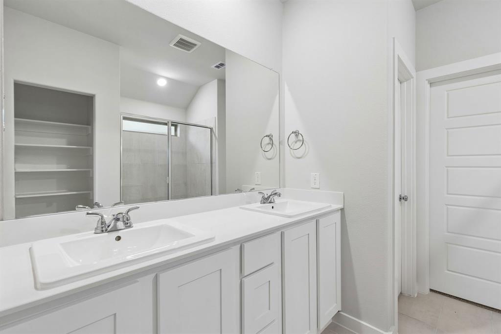 1140 Del Rio Drive Lavon, TX 75166 - Photo 16 of 32 Primary Bathroom in the Oscar home plan by Trophy Signature Homes – REPRESENTATIVE PHOTO