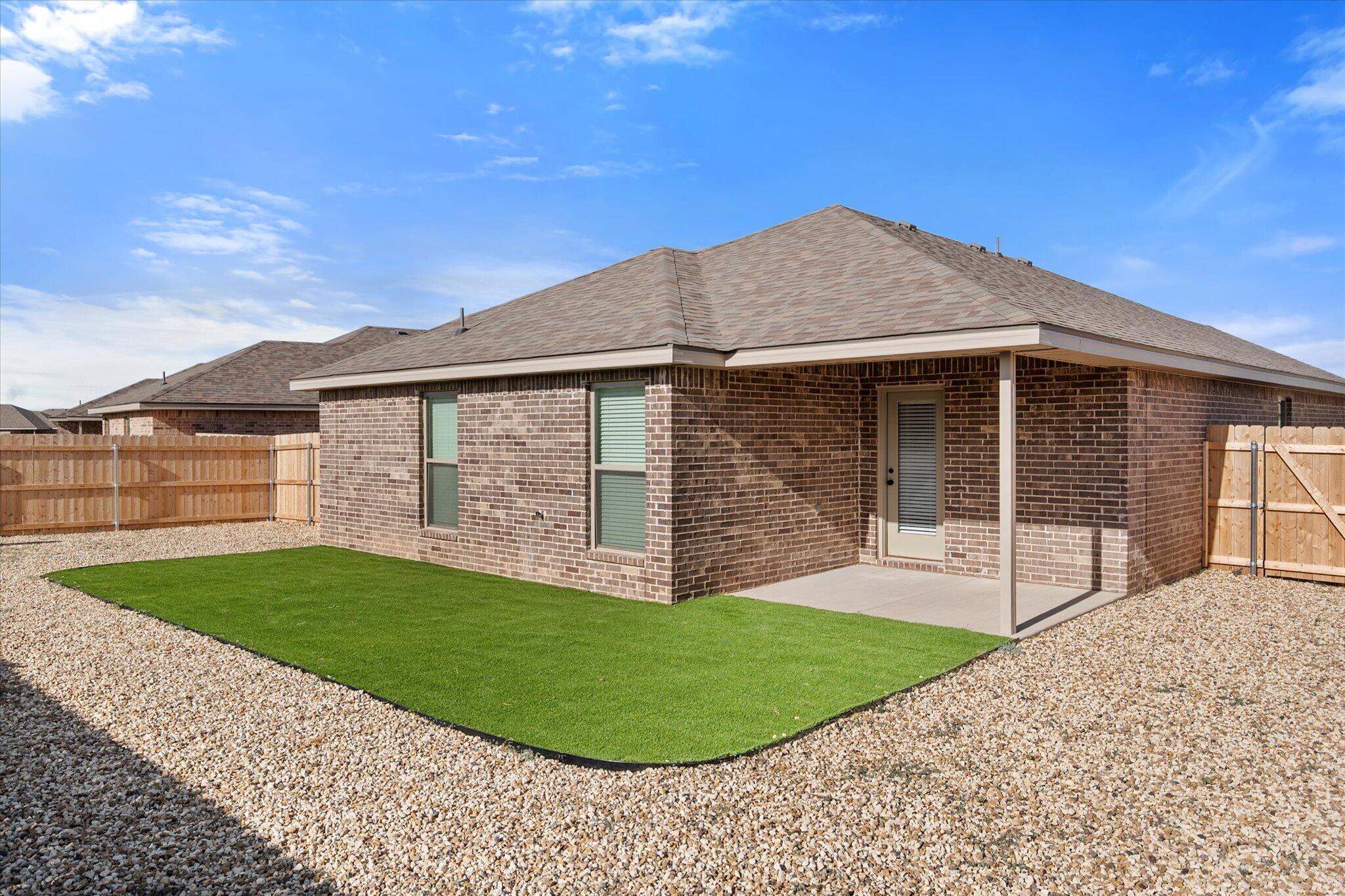 2146 Kokomo Avenue Lubbock, TX 79407 - Photo 10 of 10 a view of a house with a yard