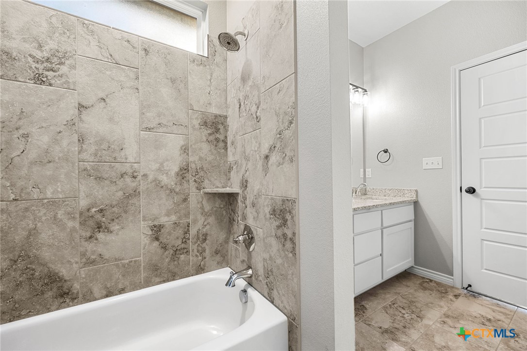 7713 Purvis Street Temple, TX 76502 - Photo 21 of 29 a bathroom with a sink a toilet and shower