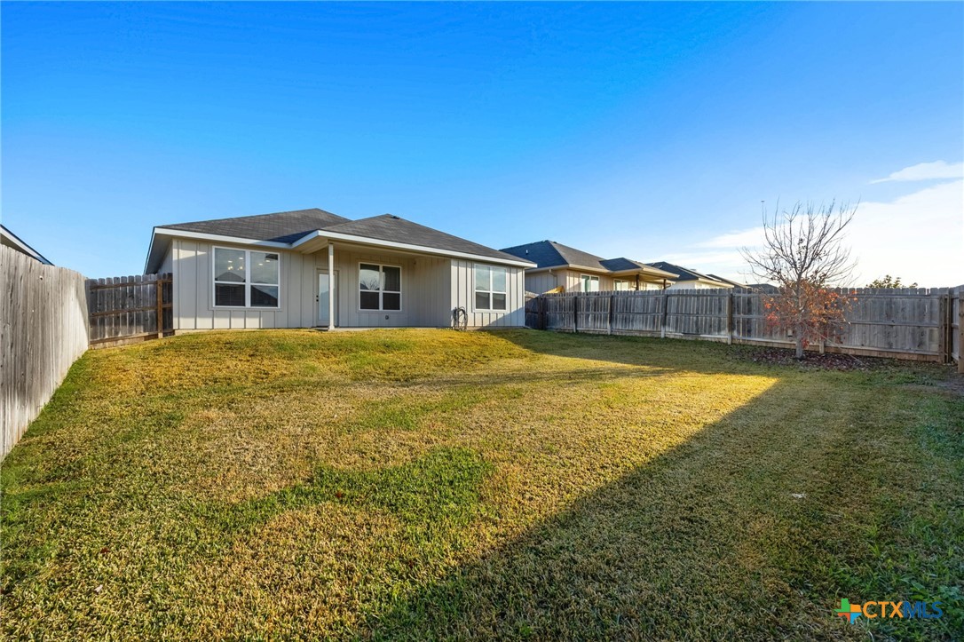 7713 Purvis Street Temple, TX 76502 - Photo 25 of 29 a view of a house with a big yard